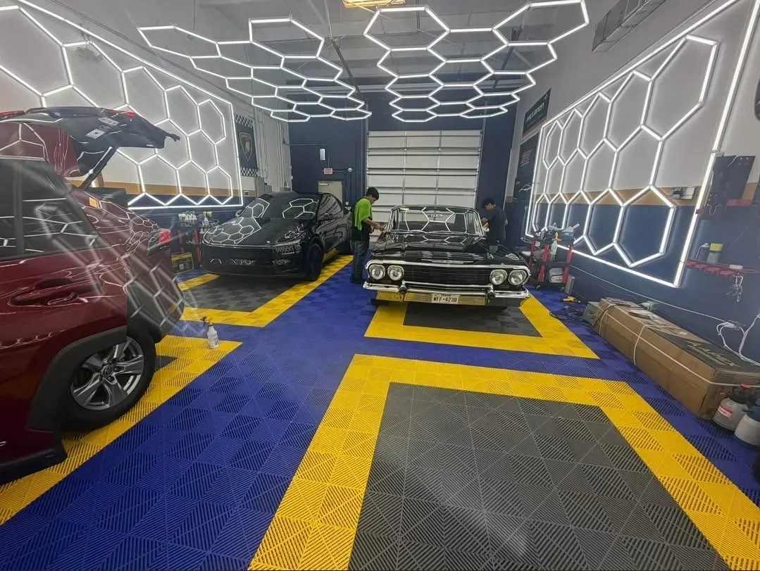 A&A shop bay with vehicles and honeycomb lights, uploaded with Jose Garcia’s Google review