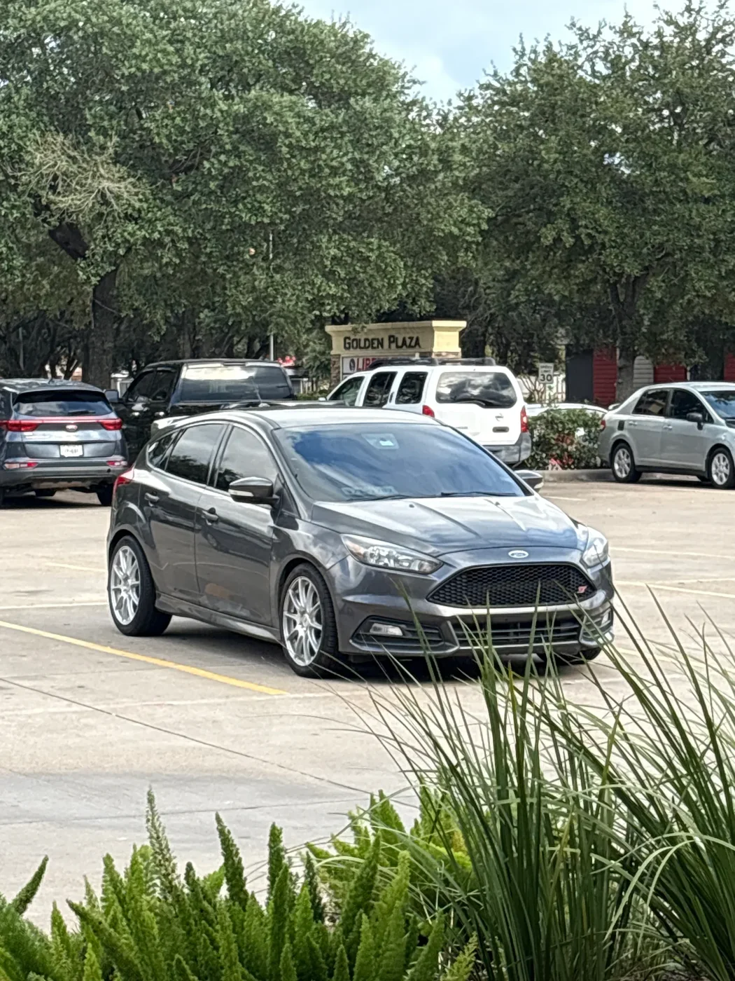 Gray Ford hatchback in the customer photo uploaded with Simon Longer’s Google review